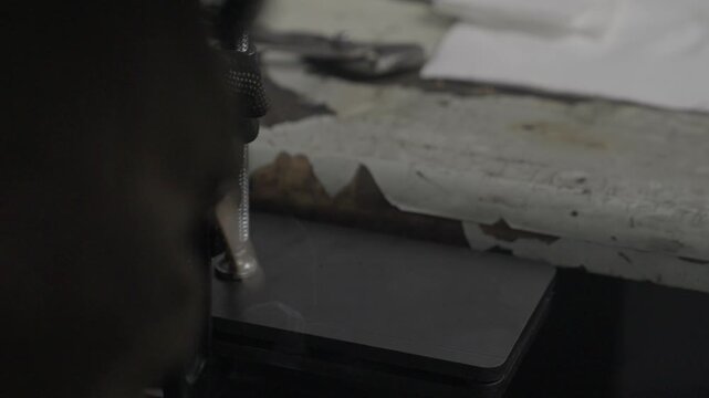 Knife burning in workshop during quenching process