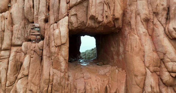 Rocce Rosse red porphyry rock formations in Arbatax, Sardinia, Italy