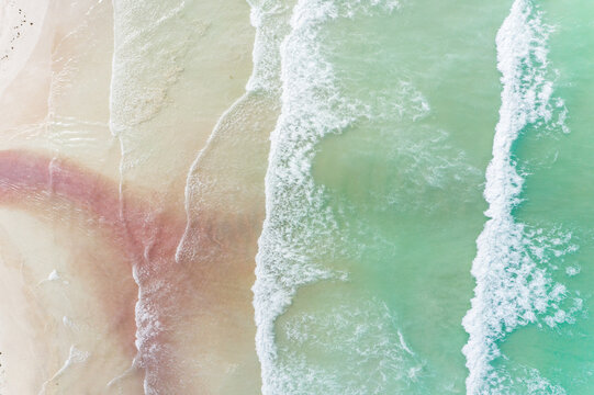 Aerial view of river exiting Las Coloradas lagoon into the sea, Yucatan, Mexico.