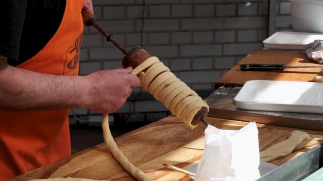 Chimney Cakes being Prepared to Proof at a Bakery in Budapest, Hungary