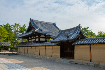 Fototapeta premium Horyu Ji Temple is a Buddhist temple in Ikaruga, Nara Prefecture, Japan. This temple belongs to Buddhist Monuments in the Horyu-ji Area UNESCO World Heritage Site.