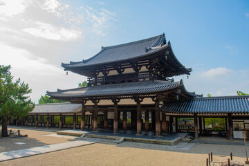 Fototapeta premium Central Gate (Chumon) of Horyu Ji Temple. This temple is a Buddhist temple in Ikaruga, Nara Prefecture, Japan. This temple is Buddhist Monuments in the Horyu-ji Area UNESCO World Heritage Site.