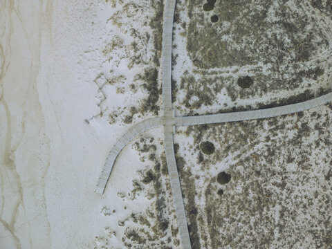 Aerial view of Praia de Quiaios with serene beach and boardwalk, Quiaios, Coimbra, Portugal.