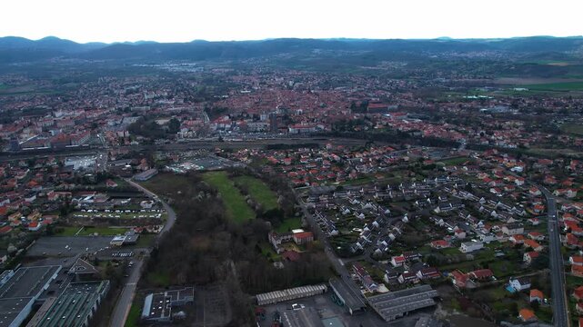  Aerial around the city Riom on a sunny day in early spring in france