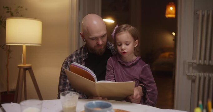 A father and daughter enjoy a magical reading moment, sharing stories together in their warm and inviting living space