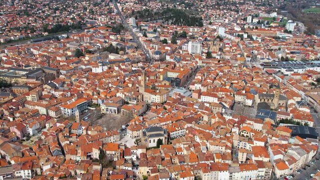 Aerial around the city Millau, 12100, France on a sunny day in early spring.