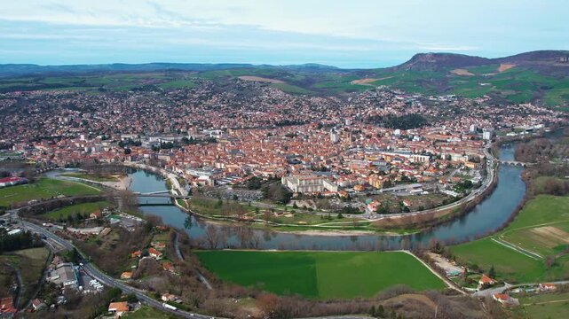 Aerial around the city Millau, 12100, France on a sunny day in early spring.