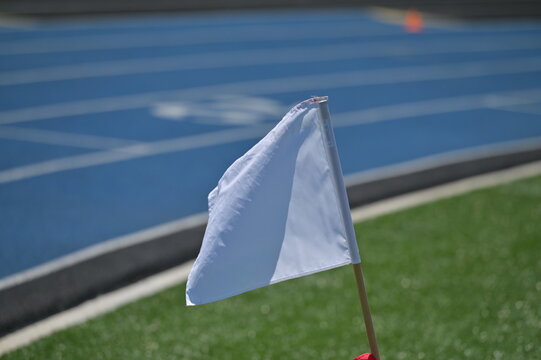 White Flag by a Sports Track