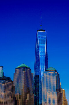 New York City, NY&mdash;June 16, 2018; One World Trade Center rises above Lower Manhattan skyscrapers under deep blue summer skies in the Financial District.