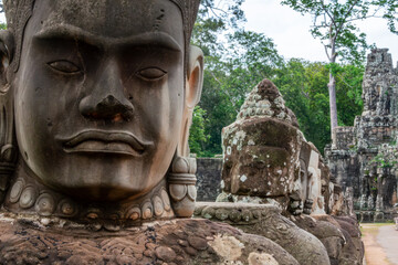 Obraz premium Close-up of Deva stone face at Angkor Thom, Cambodia.
