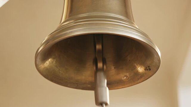 Brass Bell Swinging with Clapper Inside, Static Close-Up, for Religion and Tradition