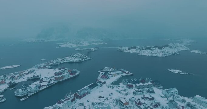 Aerial view fo Henningsvaer lofoten on the snow storm
