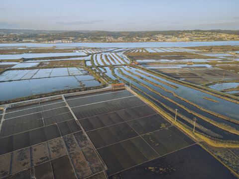 Aerial view of colorful salt marshes and wetlands with intricate patterns, Figueira da Foz, Coimbra, Portugal.