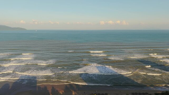 Vietnam, Da Nang Da Nang Palm Coastline At Sunrise, Elevated View Over Palmfringed Beach With Gentle Rolling Waves, Sandy Shore Shadows And Calm Turquoise Water Ideal For Resort And Travel