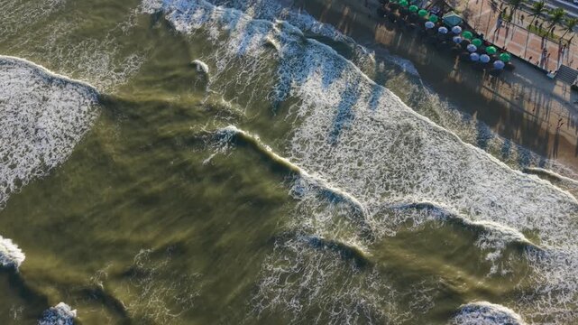 Vietnam, Da Nang Da Nang Shoreline Surf From Above, Close Aerial Shot Of Green Surf Lines Breaking Over Shallow Sand, Umbrella Dots On Promenade, Wet Sand Textures And Foamy White Crests