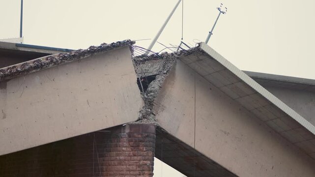 Dresden Carola bridge (Carolabr&uuml;cke) collapsed. Broken reinforced concrete structure close-up. Material damage due to corrosion caused instability. Failed building function.