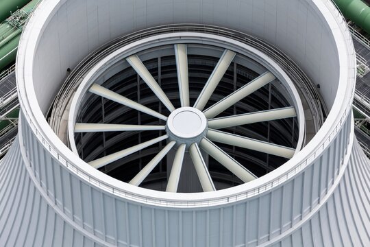 Cooling tower fan rotating, part of a power plant's ventilation system. Engineering and industry concept