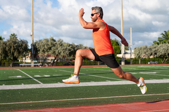 Sportsman jogger running. Man sportsman running for exercise. Sport athlete man run. Cardio workout. Runner at long sport run. Sportsman runner running outdoor. Sport run. Muscular man running