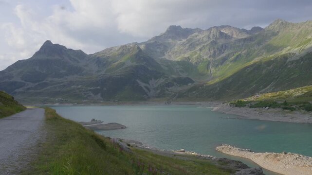 Italian Alps mountains above Lago di Montespluga Lombardy region of Italy Montespluga Dam reservoir