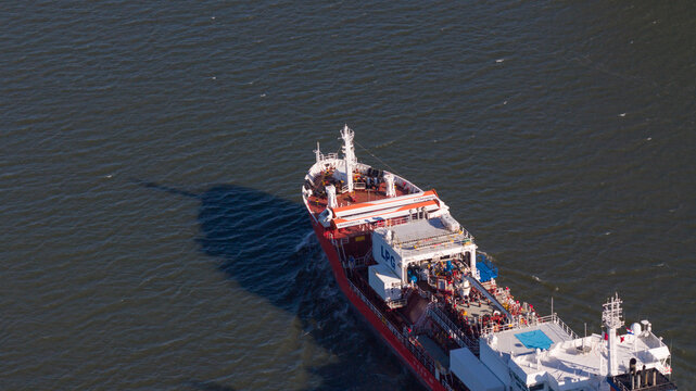 Dordrecht, Netherlands - 29 April 2026: Drone view of Coral Pearl with folded WAPS units, showing eSAIL and wingsail technology for fuel saving and more sustainable maritime transport.