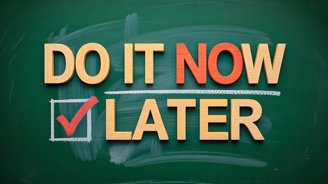 Do it now not later motivation concept on green chalkboard background