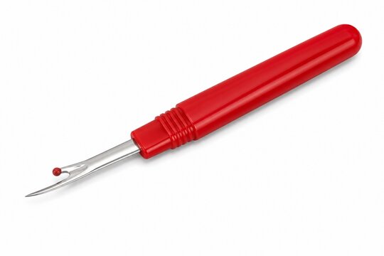 Essential red seam ripper tool for precision unpicking and correction in sewing projects, isolated on a clean white background, perfect for crafters and tailors