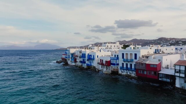 Little Venice in Mykonos island, traditional whitewashed homes on Aegean sea shore, Aerial view
