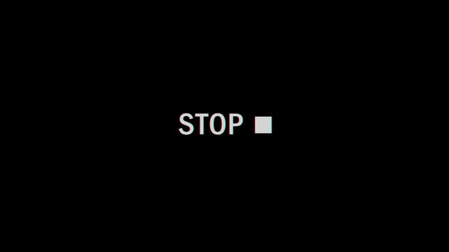 VHS tape animation stops with pixel glitching effect. Black background, 4k video.