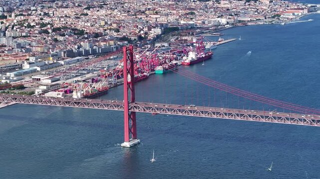 A breathtaking journey over Lisbon showcases the vibrant city and its famous red bridge. The river glistens as boats glide by, revealing the beauty of this enchanting place.