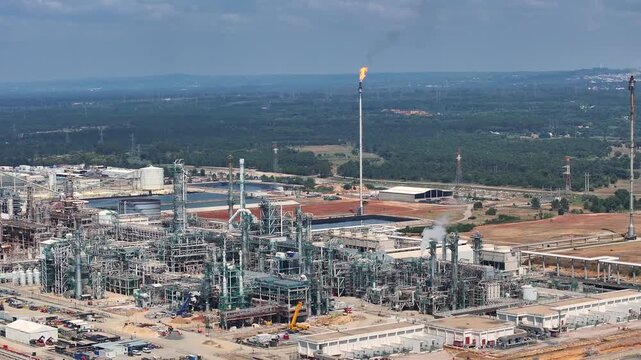 Witness the transformation of an oil refinery as it undergoes expansion to enhance its crude oil processing capabilities.