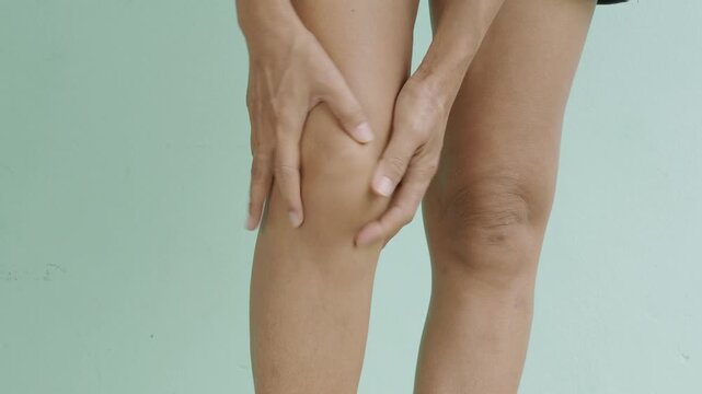 Woman massage knee pain foot woman, sprain feet heel knee sore people chronic joint leg hurt injury bone arthritis skeleton girl accident fitness sport exercise medical care