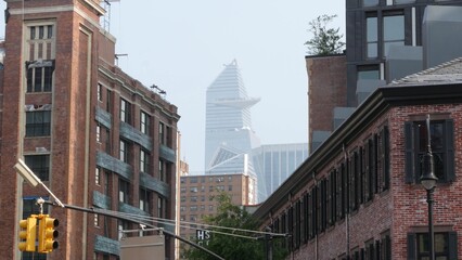 Obraz premium New York City Manhattan Midtown Hudson Yards district towers, United States. Urban skyscraper building architecture, contrast. Cityscape of Meatpacking district, Chelsea. Brick houses, historic market