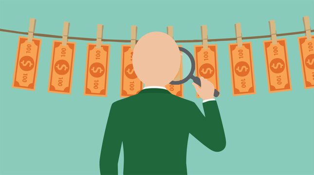 Financial investigator inspecting money laundering on a clothesline