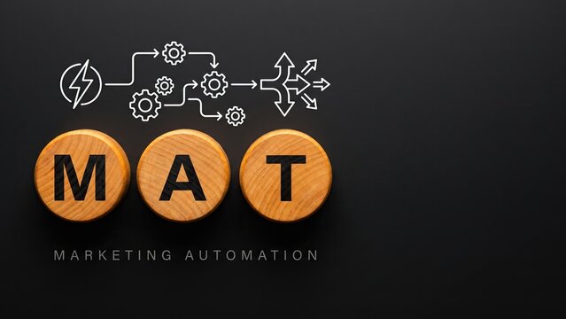 Three warm wood discs spelling MAT with a workflow gear and trigger-arrow icon above on a deep charcoal background for marketing automation strategy.