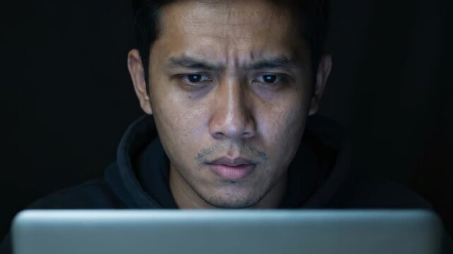 Coding bootcamp screen night session focus tension intense gaze