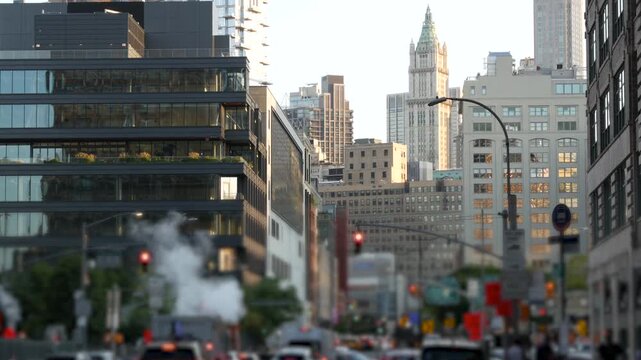 New York City, United States of America. Lower Manhattan Downtown Varick street. Woolworth building skyscraper, urban road car traffic. Hot steam smoke stack. Canal street crossroad, Tribeca.