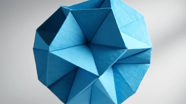Geometric blue origami structure abstract paper art in minimalist style