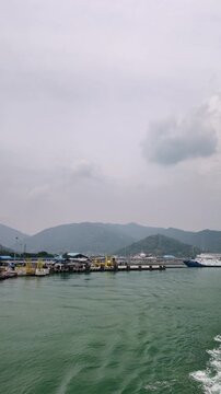 Vertical Shot of Busy Ferry Port and Industrial Harbor at Merak Indonesia