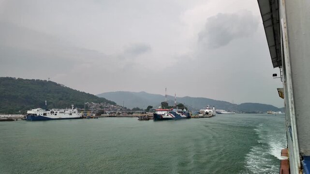 Industrial Seaport Scene at Merak Harbor with Ferries and Cargo Vessels