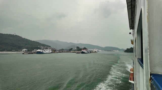 Panoramic View of Merak Seaport Terminal with Mountainous Horizon