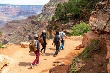 Group of hikers trekking bright angel trail in grand canyon national park © unai