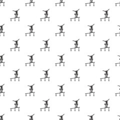 Fototapeta premium Skateboarder performing a trick on a rail, creating a seamless monochrome street sport pattern