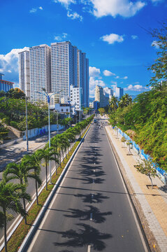 urban road with skyscrapers and blue sky in nha trang