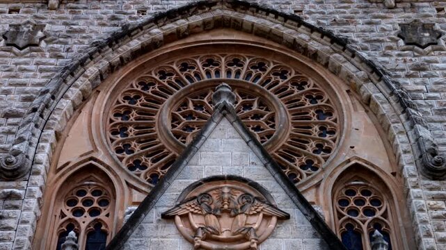 Mallorca, Spain. 07-28-2026. Church of Sant Bartomeu S&oacute;ller facade detail. Tilt 4K
