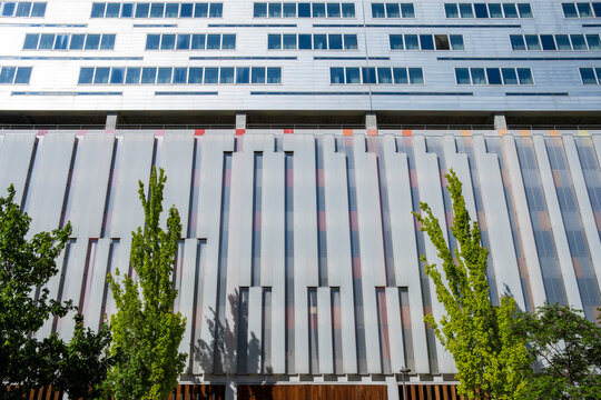 Pattern, windows and facade geometry shape a clean urban building study at La Confluence in Lyon, France, within contemporary architecture