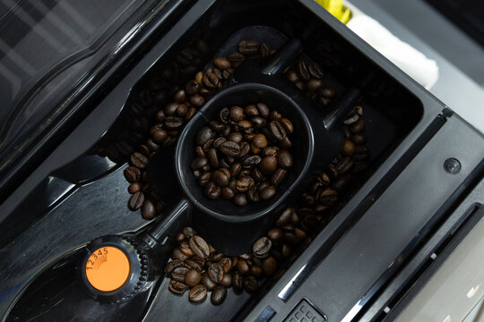 domestic coffee machine bean hopper with roasted coffee beans