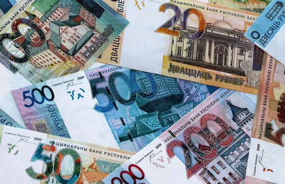 Belarusian ruble money banknotes pile on table. Belarus bills of BYN currency close up