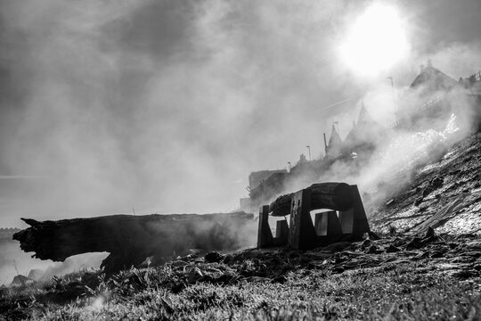 Steaming pipeline next to Danube in Budapest during sunny summer weather with black and white photo