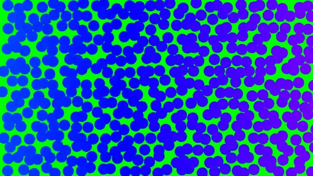 Dynamic abstract concept of irregular blue spheres scattered across, fading out animation to green screen