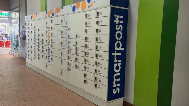 Vilnius Lithuania 02.04.2026 Smartpost parcel locker station inside shopping mall with automated delivery boxes and modern self service logistics technology concept